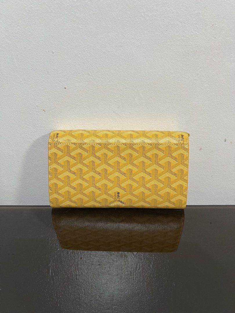 goyard wallet on leather strap / chain (Category: Luxury Bags & Wallets) located in Makati City. Submitted by vnz.flrls (Listing ID 1440744013, Image 2). Description: AUTH NOT GUARANTEED ᡣ𐭩 ྀིྀ Condition: Excellent Condition ᡣ𐭩 ྀིྀ Rating: 10/10 ᡣ𐭩 ྀིྀ Issues / flaws: none ᡣ𐭩 ྀིྀ Color: yellow ᡣ𐭩 ྀིྀ Dimensions: 19x11 cm (LxH) ᡣ𐭩 ྀིྀ Inclusions: dust bag - with freebies 🫧 Note: please manage your expectations, might have signs of usage. ki