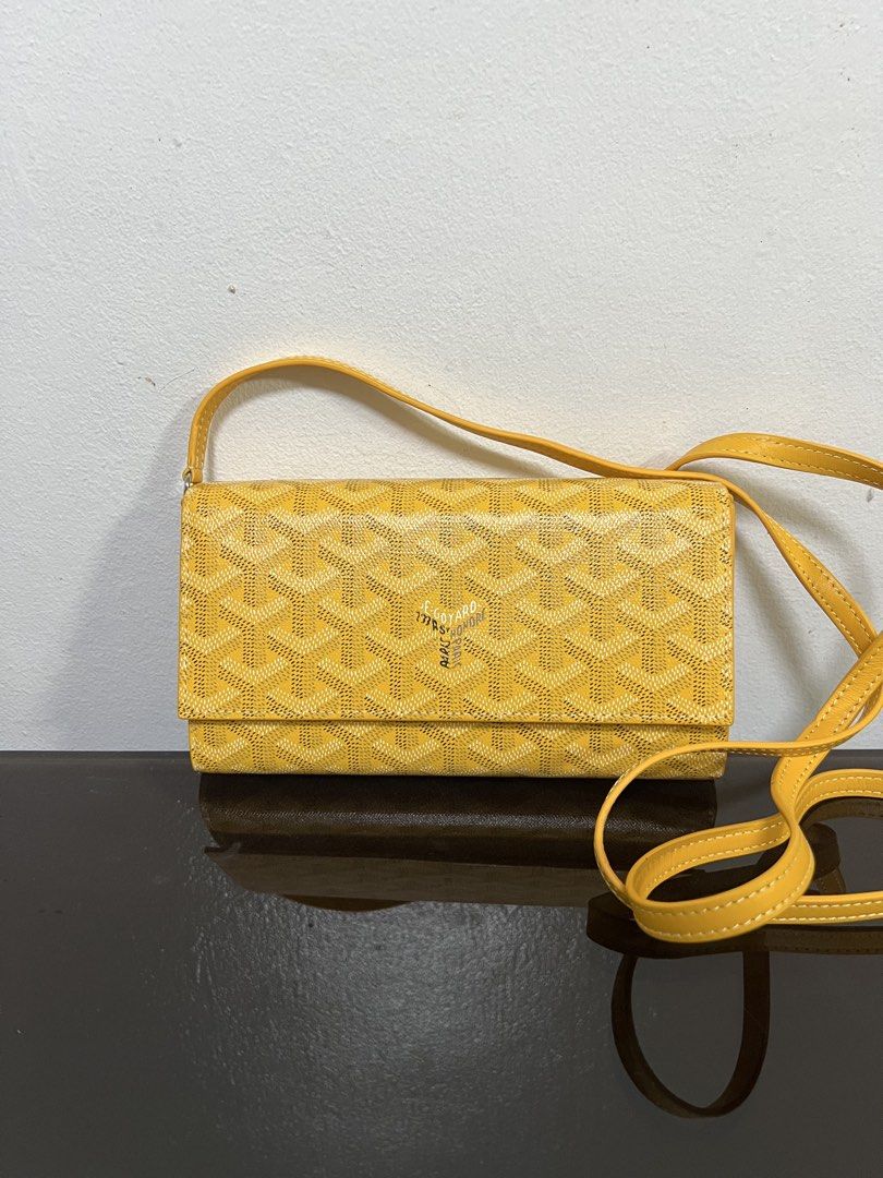 goyard wallet on leather strap / chain (Category: Luxury Bags & Wallets) located in Makati City. Submitted by vnz.flrls (Listing ID 1440744013, Image 3). Description: AUTH NOT GUARANTEED ᡣ𐭩 ྀིྀ Condition: Excellent Condition ᡣ𐭩 ྀིྀ Rating: 10/10 ᡣ𐭩 ྀིྀ Issues / flaws: none ᡣ𐭩 ྀིྀ Color: yellow ᡣ𐭩 ྀིྀ Dimensions: 19x11 cm (LxH) ᡣ𐭩 ྀིྀ Inclusions: dust bag - with freebies 🫧 Note: please manage your expectations, might have signs of usage. ki