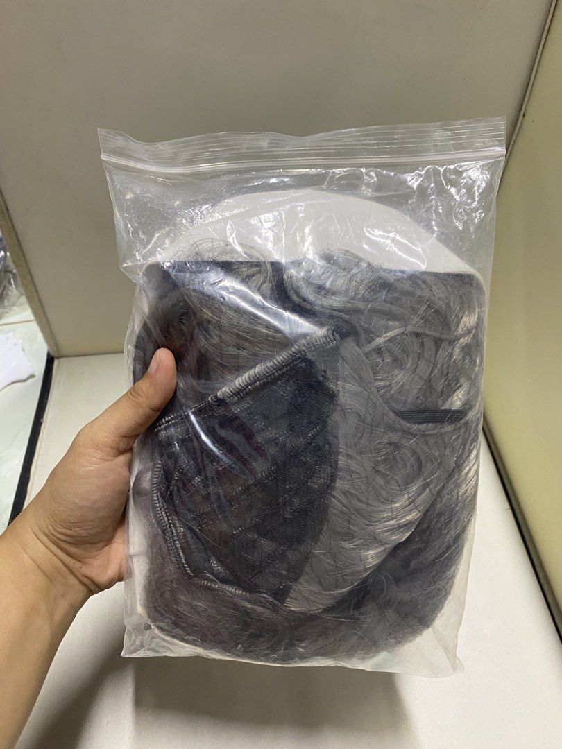 Grey Wavy Long Wig Hairpiece (Category: Hair Accessories) located in Pasacao. Submitted by wengpullar37205 (Listing ID 1440731191, Image 1). Description: - Grey long wavy wig - Synthetic hair appearance - Mesh cap with adjustable straps - Ideal for costumes or everyday wear - Selling because it's no longer needed -free napo ung short hair,super lambot ng Hair nia.