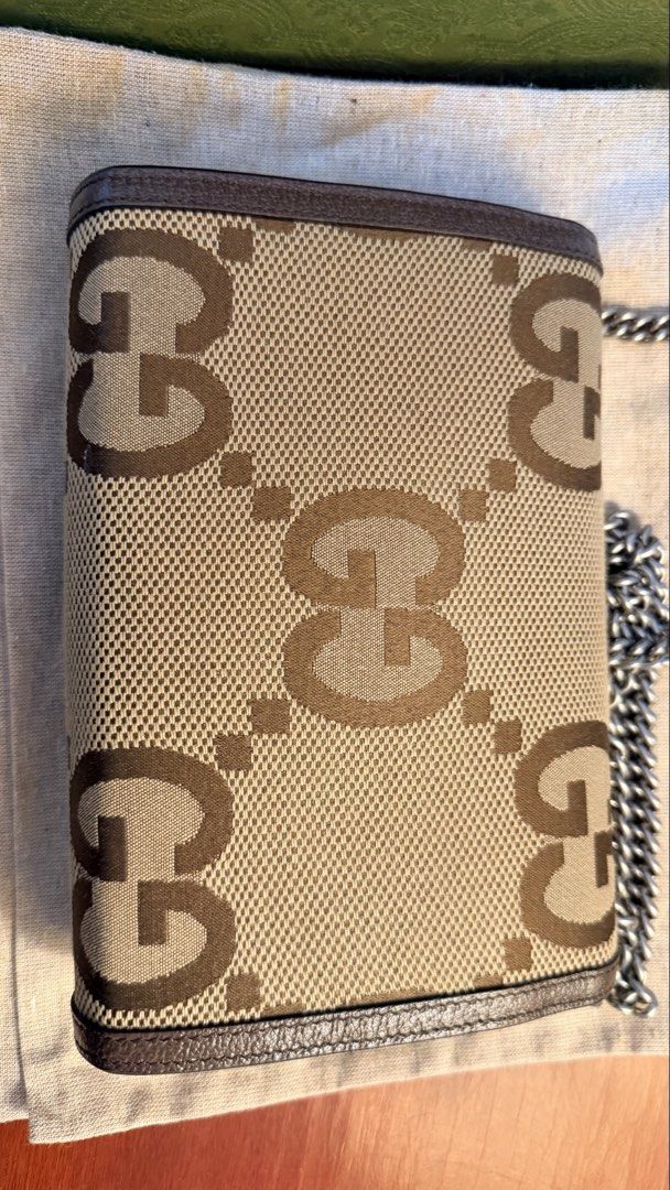Gucci GG Monogram Wallet with Chain (Category: Luxury Bags & Wallets) located in Rizal. Submitted by mlouise22 (Listing ID 1440646148, Image 3). Description: - Authentic Gucci wallet on chain - Iconic GG monogram canvas with leather trim - Detachable chain strap - Unique snake head closure - Multiple interior card slots - Interior zip pocket - Comes with original box - Includes dust bag - Original receipt available for authetication Bought it at 