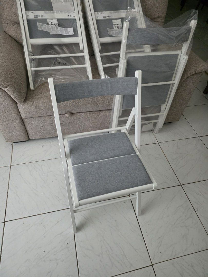 IKEA FRÖSVI folding chairs white/Knisa light gray (Category: Chairs) located in Taguig. Submitted by agirlwithluv (Listing ID 1440604055, Image 1). Description: brand new, mint, unused, sealed SRP: ₱2499/pc sale: ₱1800/pc + lsf SOLD IN PAIRS dimensions in pics rfs: got a different set .