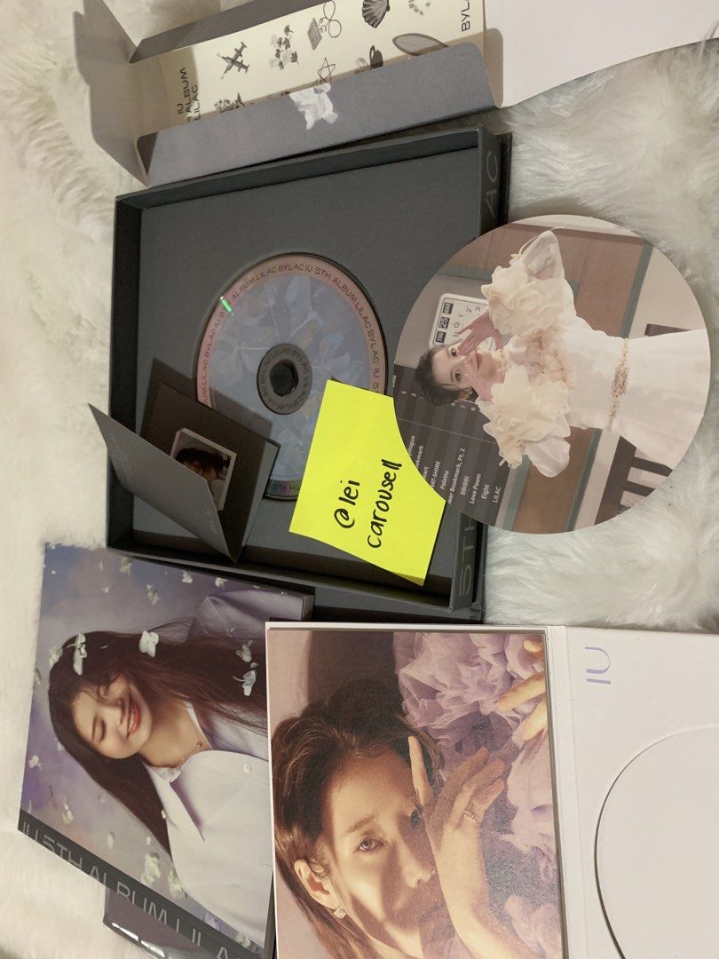 IU 5th Album LILAC BYLAC Version K-pop CD (Category: CDs & DVDs) located in Las Pinas. Submitted by soleilily (Listing ID 1440669383, Image 3). Description: - IU's 5th Album: LILAC (BYLAC Version) - Includes: CD, Photobook - Bonus Items: Postcard, Round Photocard - Condition: Great - A must-have for any UAENA! -Unsealed -No PC MOP: Gcash MOD: j&t (shipping fee c/o buyer) 📍las piñas.