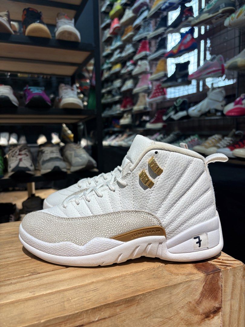 Jordan 12 (Category: Sneakers) located in Baguio. Submitted by ms.j_sneakersshop (Listing ID 1440615337, Image 2). Description: - White and Gold Jordan 12s - Size: 7Y (equivalent to 40 EUR / 25 CM) -pre loved.