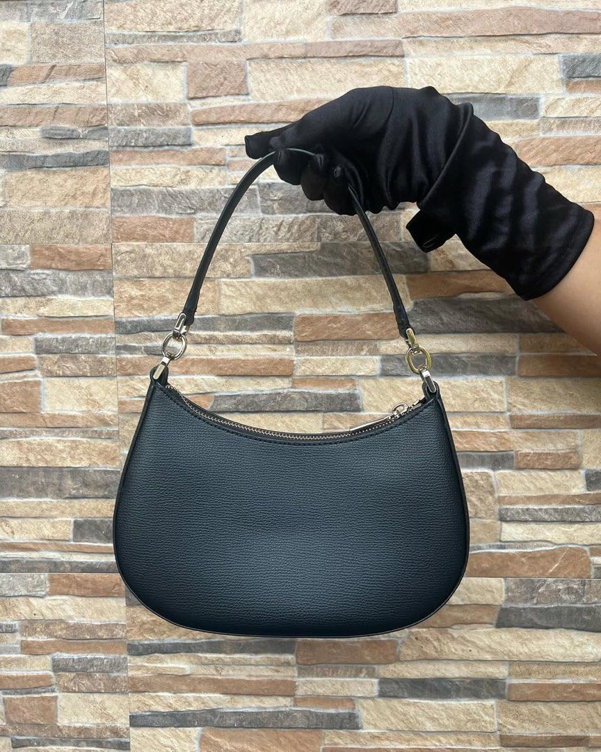 Kate Spade Kristi (Category: Luxury Bags & Wallets) located in Cavite. Submitted by justbrowsing_decluttering (Listing ID 1440732394, Image 3). Description: Shoulder Bag Color: Black with Light Gold Hardware Size: Small-Medium Material: Genuine Leather [Colors may vary due to lighting. Bags are Preowned so it will Not be Perfect; Unless stated new.] No sling | Signs of use in hardware Guaranteed Authentic💯 Rank A Condition: 8.5/10.
