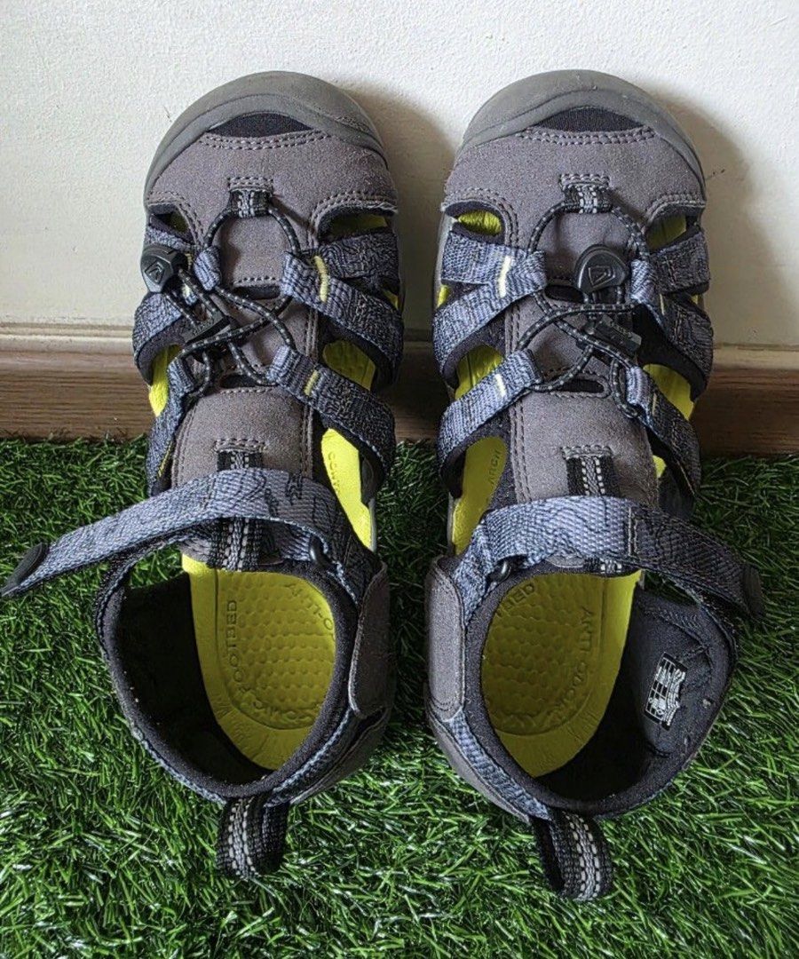 KEEN Newport H2 Water Sandals Grey Yellow Kids Size (Category: Babies & Kids Fashion) located in Singapore. Submitted by atwatw (Listing ID 1440583793, Image 1). Description: - KEEN Newport H2 kids' sandals - Colour: Grey with yellow accents - Quick-drying straps - Protective toe bumper - Easy on/off with hook-and-loop closure - Ideal for outdoor adventures and water play - Durable rubber outsole for excellent grip - size: US4 / UK3 / EU36 / 22.5