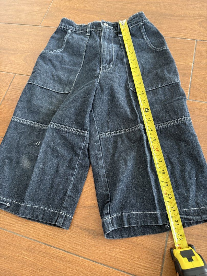 Kid Jordan Denim Shorts Size L (Category: Babies & Kids Fashion) located in Bulacan. Submitted by emjay_17 (Listing ID 1440594824, Image 2). Description: Measurements are in the photos📌 - Brand: Kid Jordan - Style: Dark wash denim shorts - Fit: Elastic waistband at the back for comfort - Length: Knee-length - Features: Multiple pockets - Condition: Light marks on the front (as pictured) - Occasion: Great for casual wear.