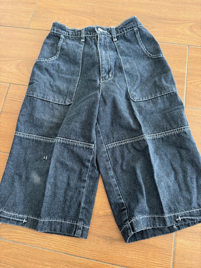 Kid Jordan Denim Shorts Size L (Category: Babies & Kids Fashion) located in Bulacan. Submitted by emjay_17 (Listing ID 1440594824, Image 1). Description: Measurements are in the photos📌 - Brand: Kid Jordan - Style: Dark wash denim shorts - Fit: Elastic waistband at the back for comfort - Length: Knee-length - Features: Multiple pockets - Condition: Light marks on the front (as pictured) - Occasion: Great for casual wear.