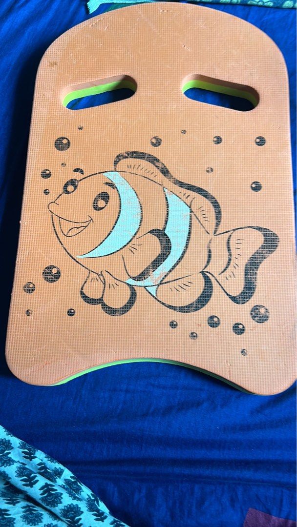 Kids Swimming Kickboard with Fish Design (Category: Water Sports) located in Singapore. Submitted by sammy_12345 (Listing ID 1440669518, Image 1). Description: - Cute orange kickboard with fish and bubbles design - Two hand grips for secure holding - Made of durable foam material - Perfect for swimming lessons and pool fun - Great for kids learning to swim.