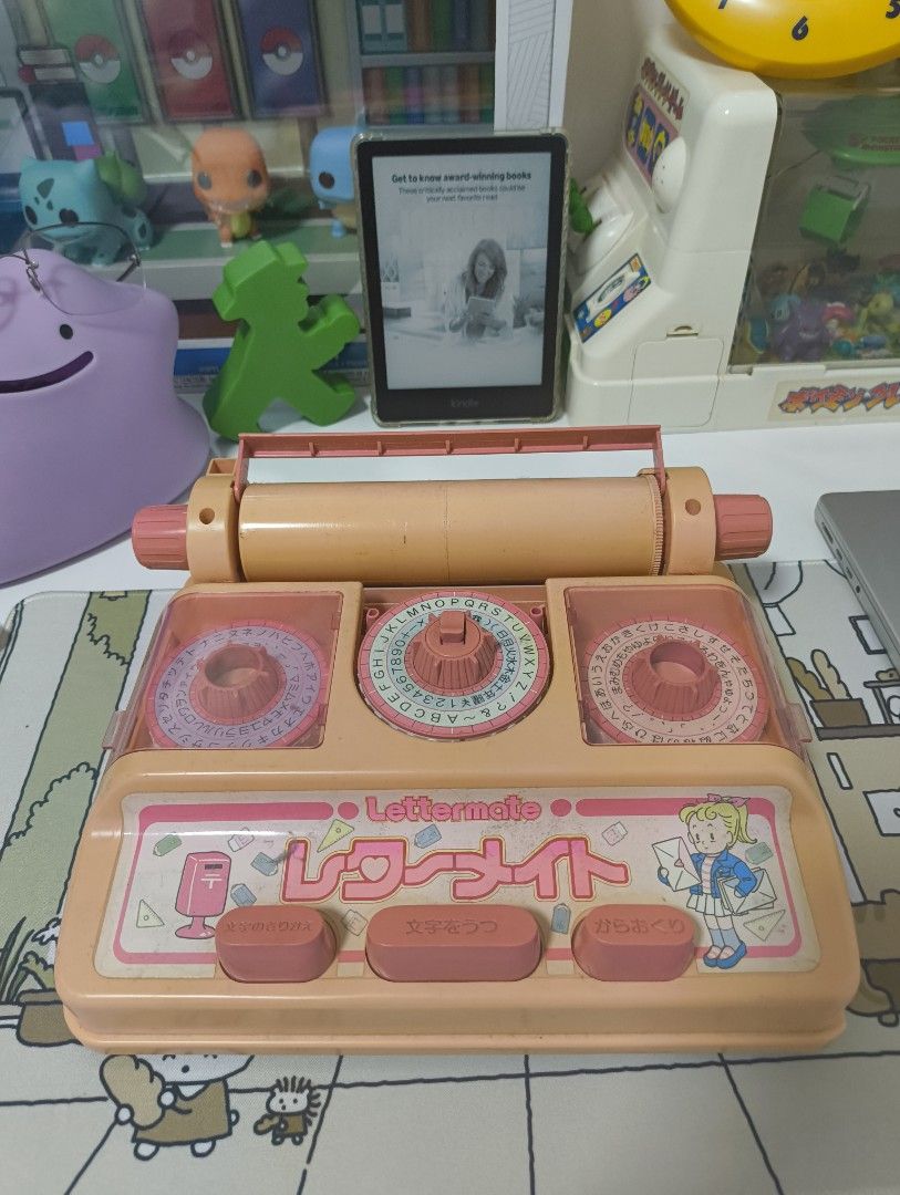 Lettermate Label Maker Pink Vintage Japanese Retro (Category: Coffee Machines & Makers) located in Caloocan City. Submitted by cowrator (Listing ID 1440729321, Image 1). Description: Vintage Japanese letter-making toy with a working mechanism. Shows age-related discoloration, scratches, scuffs, and small chips. Not in perfect condition, but still a great collectible or display piece. Condition: Working mechanism. Cosmetic wear consistent with age