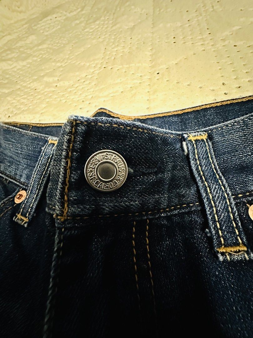 Levi's 501 Jeans tokong (Category: Jeans) located in Calamba. Submitted by nympha0630 (Listing ID 1440658050, Image 3). Description: - Classic Levi's 501 jeans - Medium wash blue denim - Frayed hem detail - Button fly closure - Wardrobe staple - Perfect for casual wear - Goes with everything Size 27 waistline Cut tag but guaranteed orig moneyback if fake.