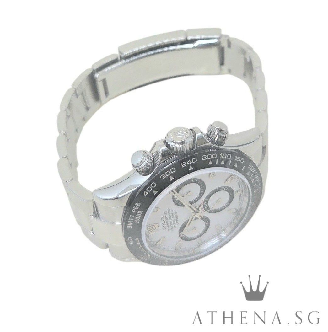 LIKE NEW!! ROLEX OYSTER PERPETUAL COSMOGRAPH DAYTONA CERAMIC 40MM “WHITE PANDA DIAL” WITH BOX, WHITE TAG & CERT DATED 05/2023 (STILL UNDER AGENT WARRANTY) 116500LN [DISCONTINUED] (Category: Watches) located in Singapore. Submitted by athenawatches (Listing ID 1440603095, Image 2). Description: JGWRL_3459 Brand Rolex Model 116500LN Series Alpha Numeric Colour of Dial White Dial with Luminescent Index Markers "Panda Chronograph Dial" Bezel Fixed Bl