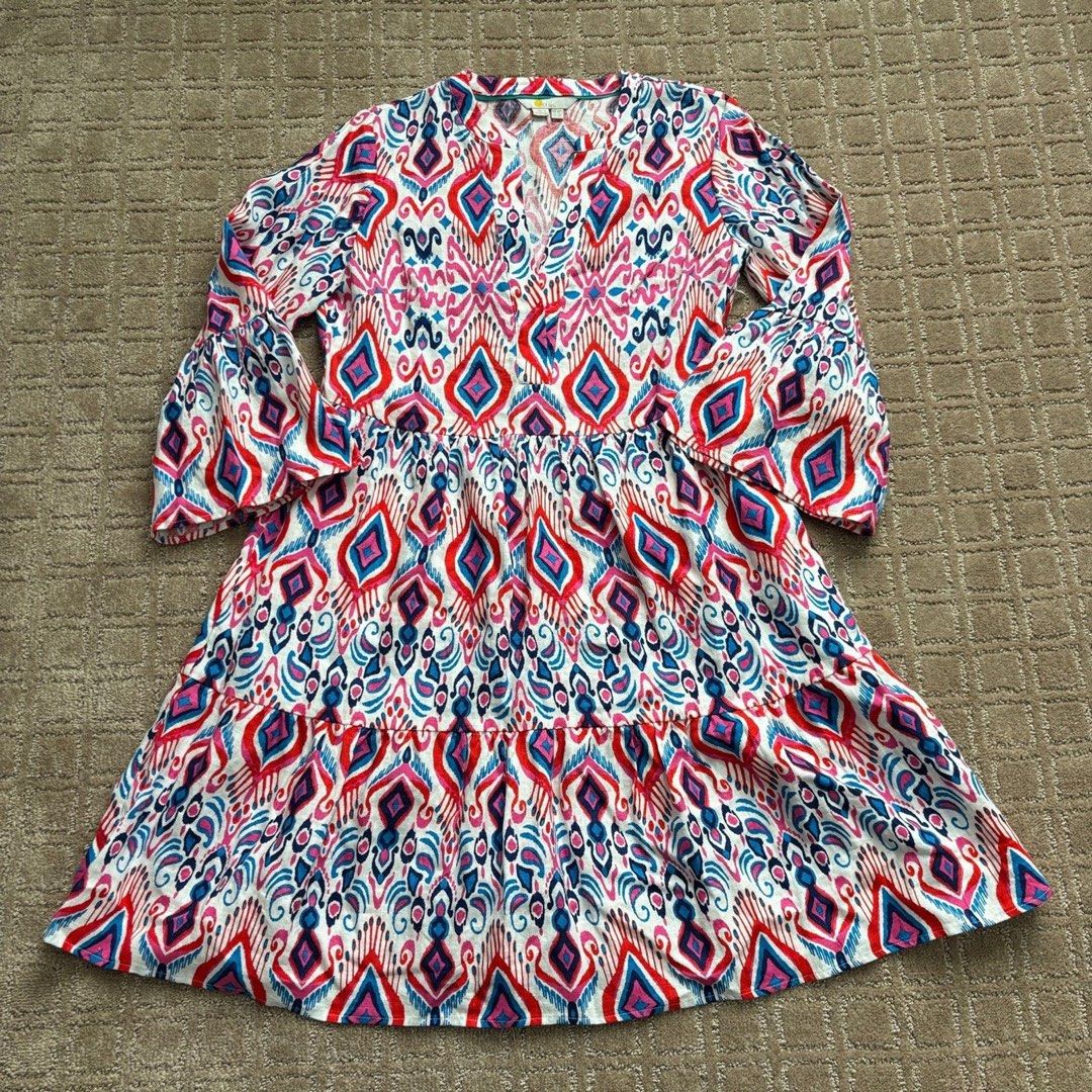 Linen Bell Sleeve Dress (Category: Dresses) located in Caloocan City. Submitted by italdeclutter (Listing ID 1440742168, Image 2). Description: - Fun and colorful tiered dress - Bell sleeves with a slight flare - V-neckline with a small slit - Vibrant ikat pattern - Ideal for casual days or vacations - Easy to wear and comfortable.