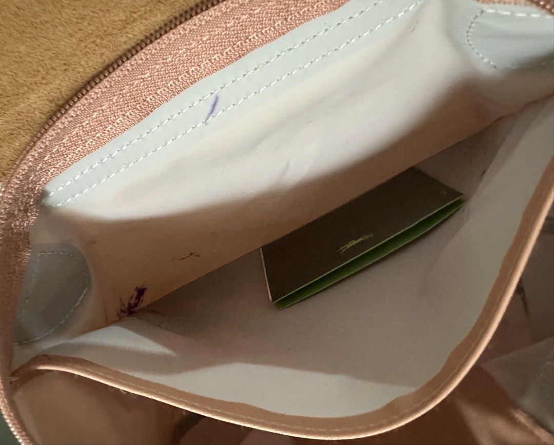Longchamp Le Pliage Tote Bag Rose Pink (Category: Luxury Bags & Wallets) located in Quezon City. Submitted by jer01 (Listing ID 1440586398, Image 3). Description: Original Rose pink Longchamp Le Pliage tote bag with leather handles and trim. Includes original tag. Perfect for daily use or travel with its spacious interior. It has minimal flaws as u can see on the photos (pen mark, signs of usage) other than that the bag inside still clean and in 