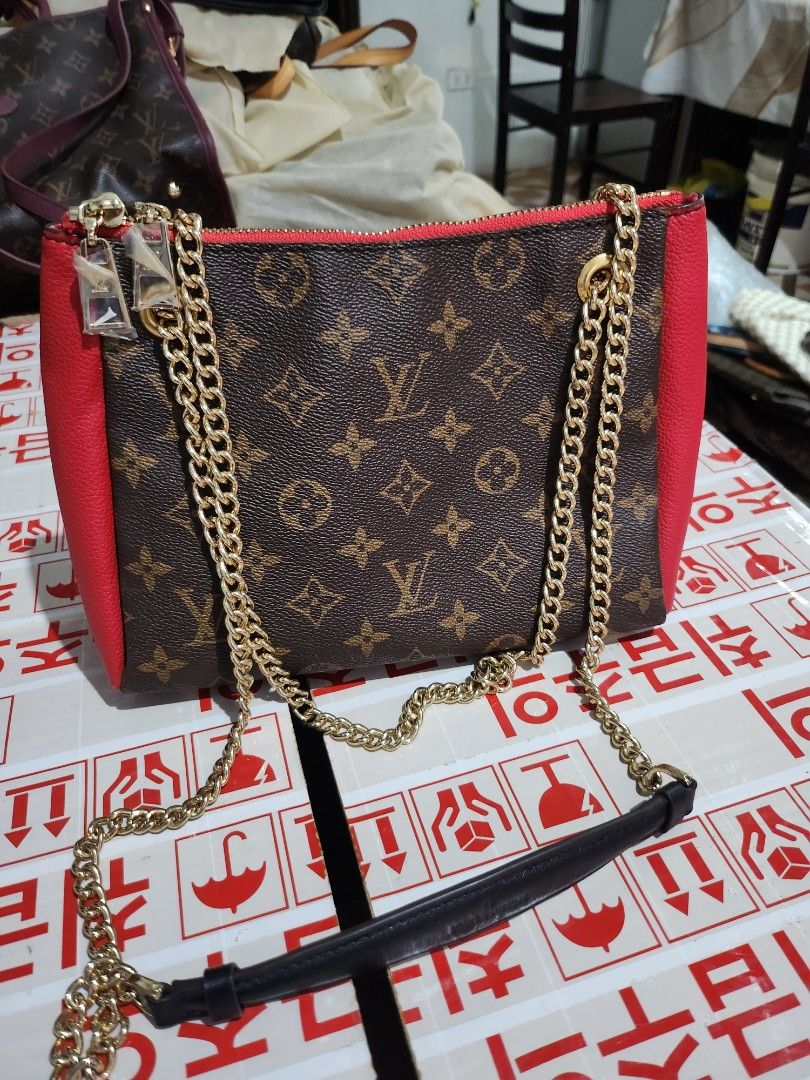 Louis Vuitton Monogram Canvas Surène BB Shoulder Bag (Category: Shoulder Bags) located in Caloocan City. Submitted by xcessbaggs (Listing ID 1440591555, Image 1). Description: New Arrival!!! In good preloved condition from Korea. Materials: Crafted from classic coated canvas paired with grained calf leather side panels. Straps: Double gold-toned chain link straps integrated with comfortable black leather shoulder pads. Interior: Features a functi