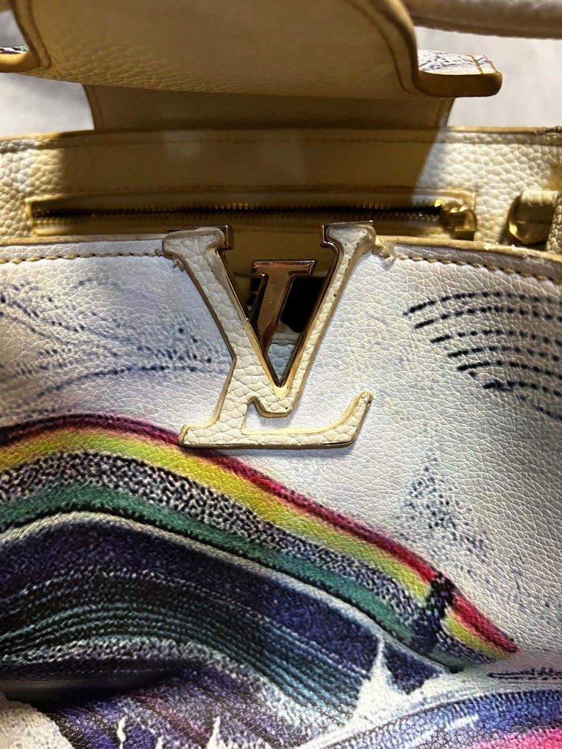 Louis Vuitton Monogram Pochette (Category: Luxury Bags & Wallets) located in Quezon City. Submitted by ozzy04 (Listing ID 1440689734, Image 3). Description: White Louis Vuitton pochette with colorful abstract print. Gold hardware details. Zipper closure. Interior has a black lining. Date code visible inside. Unique design..