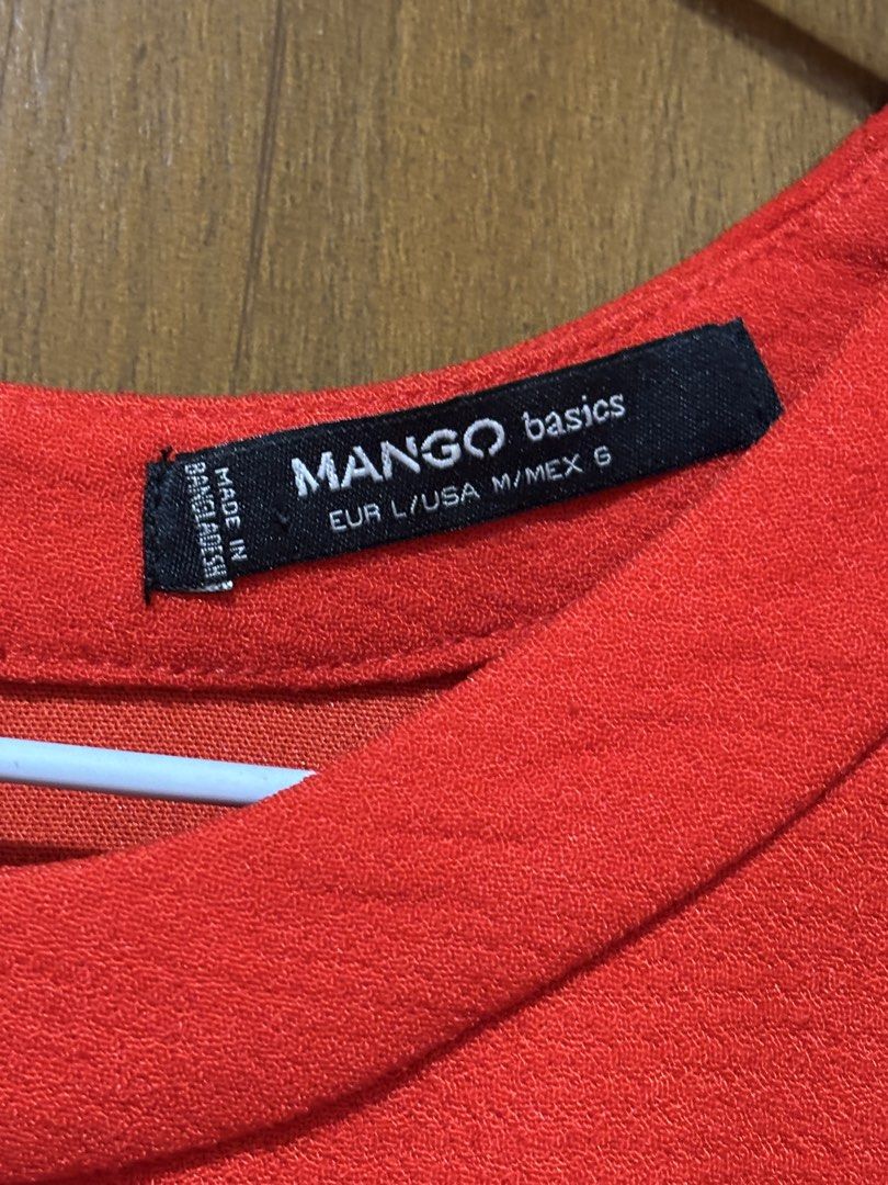 Mango Basics Red Textured Short Sleeve Dress (Category: Dresses) located in Manila. Submitted by senior.declutter (Listing ID 1440605176, Image 3). Description: - Mango Basics red textured shift dress - Short sleeves - Crew neck - Back zipper closure - Classic shift style - Versatile for casual or semi-formal occasions - Dimensions: shoulder 16” chest circumference 42” length 35” RFS: decluttering .