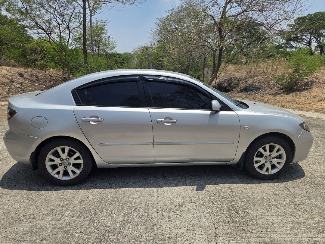 Mazda 3 1.5 6AT Deluxe (A) (Category: Used Cars) located in Muntinlupa City. Submitted by hustler2023 (Listing ID 1440622513, Image 3). Description: For Sale: Mazda 31.6 Automatic and Manual - Year:2011 - Owner: First owner - Mileage: 100xxx km - Condition: Super clean interior, all stock inside and out -All 4 new yokohama tires installed on March 24 2026 - New battery motolite gold with warranty - NewAutomatic engine oil in 2023 - NewTiming belt