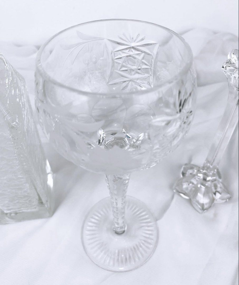 Mixed Glass/Crystals (Category: Other Home Decor) located in Pasay City. Submitted by thepickypicker (Listing ID 1440699292, Image 3). Description: Mixed Glass/Crystals Mikasa Crystal candle holder P280 Size: 6 3/8 tall Tall Bohemia Crystal Goblet, Etched P580 Size: 8 3/8 tall, 3" wide Crackled Lopsided Vase P480 Size: 7 3/8 tall, 2 3/8.