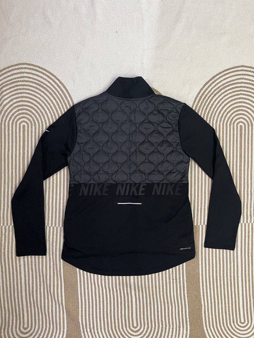 Nike Aeroloft Therma-FIT Quilted Jacket (Category: Coats, Jackets and Outerwear) located in Candaba. Submitted by thriftshitsph01 (Listing ID 1440689261, Image 3). Description: - Nike Therma-FIT & Aeroloft technology for superior warmth - Quilted front panel for insulation - Long sleeves for full coverage - Nike branding across the waist for a stylish touch - Standard fit for comfortable wear - Ideal for workouts or everyday casual use - Brand ne