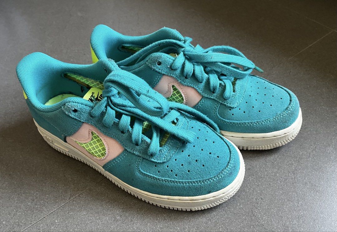 Nike Air Force 1 Low Teal Pink Green (Category: Sneakers) located in Subic. Submitted by round.thrift (Listing ID 1440598596, Image 1). Description: - US 4y / US 5.5 women’s - Cool teal Nike Air Force 1s - Pink and green accents on the swoosh - Neon yellow heel tab and inner lining - Classic AF1 silhouette - Great for everyday wear - Minor signs of wear on insoles and soles.