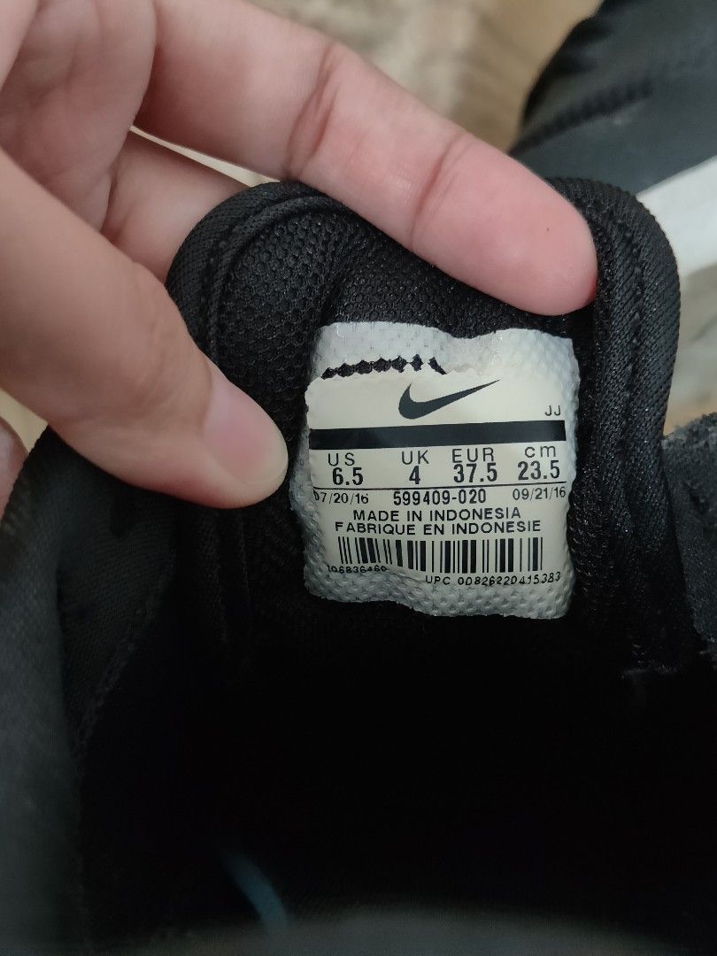 Nike black sneakers Thea womens shoes (with box) (Category: Sneakers) located in Cavite. Submitted by itstrish23 (Listing ID 1440623237, Image 3). Description: original mall bought size US 6.5 womens slightly nego with major flaw: matatanggal na pagkaka dikit ng outsole but this can be easily repaired after that magagamit pa sya talaga (see last photos) needs cleaning lang pero goods pa to rfs: decluttering seller from Cavite 😊.