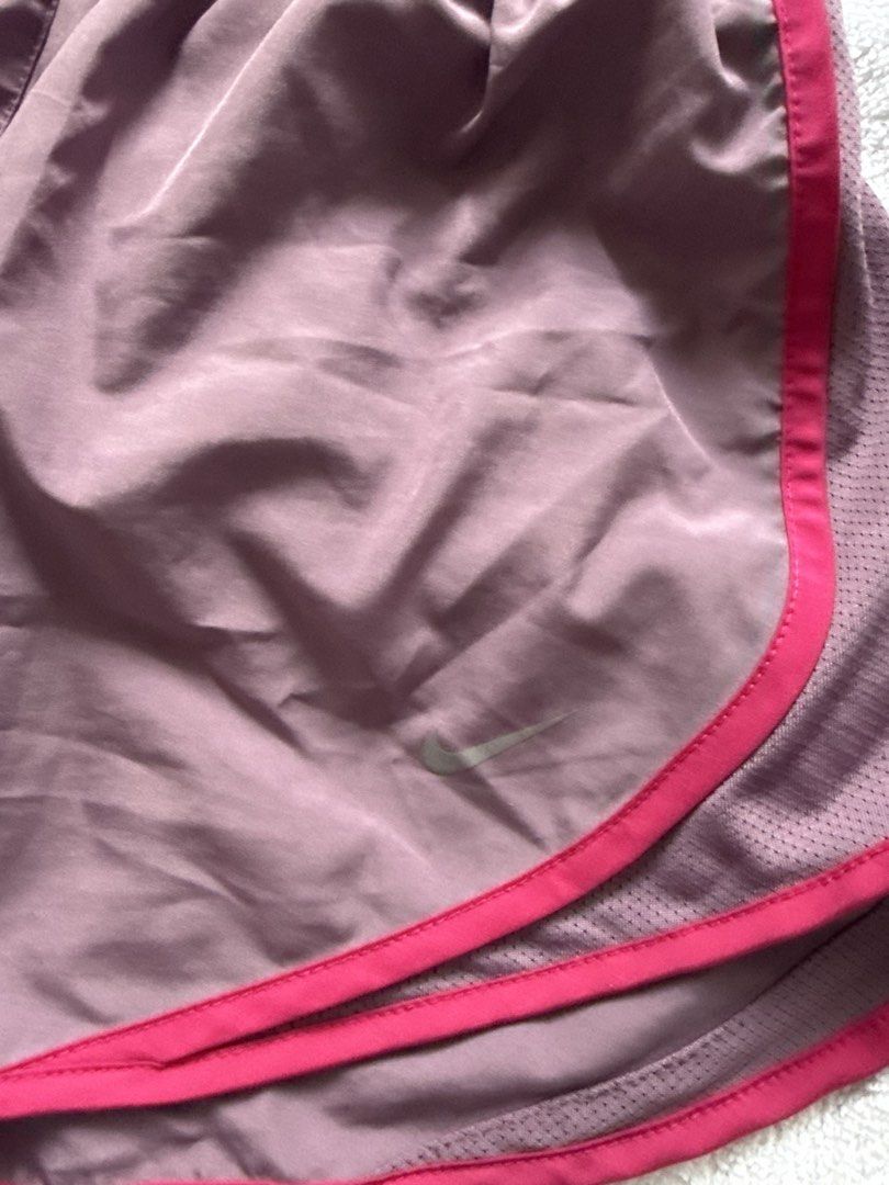 Nike Dri-Fit Running Shorts (Category: Activewear) located in Panglao. Submitted by whatsdbuzz (Listing ID 1440669823, Image 2). Description: Nike Dri-Fit running shorts - Color: Purple with pink trim -original Nike - like new used 2x only -color rate: 10/10 - Size: L.