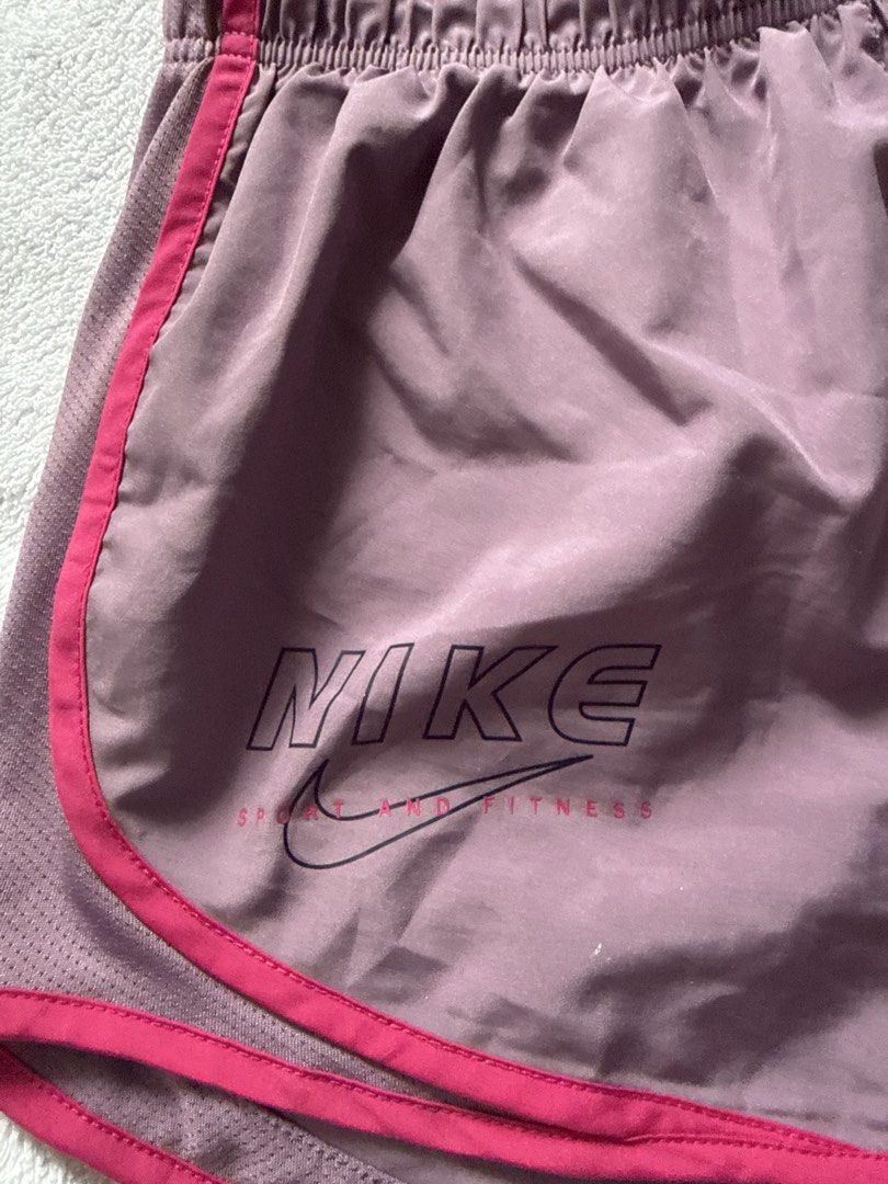 Nike Dri-Fit Running Shorts (Category: Activewear) located in Panglao. Submitted by whatsdbuzz (Listing ID 1440669823, Image 3). Description: Nike Dri-Fit running shorts - Color: Purple with pink trim -original Nike - like new used 2x only -color rate: 10/10 - Size: L.