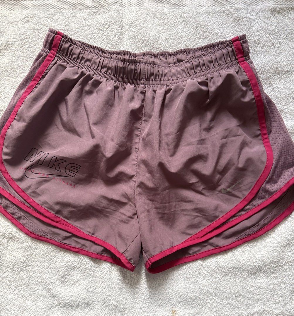 Nike Dri-Fit Running Shorts (Category: Activewear) located in Panglao. Submitted by whatsdbuzz (Listing ID 1440669823, Image 1). Description: Nike Dri-Fit running shorts - Color: Purple with pink trim -original Nike - like new used 2x only -color rate: 10/10 - Size: L.