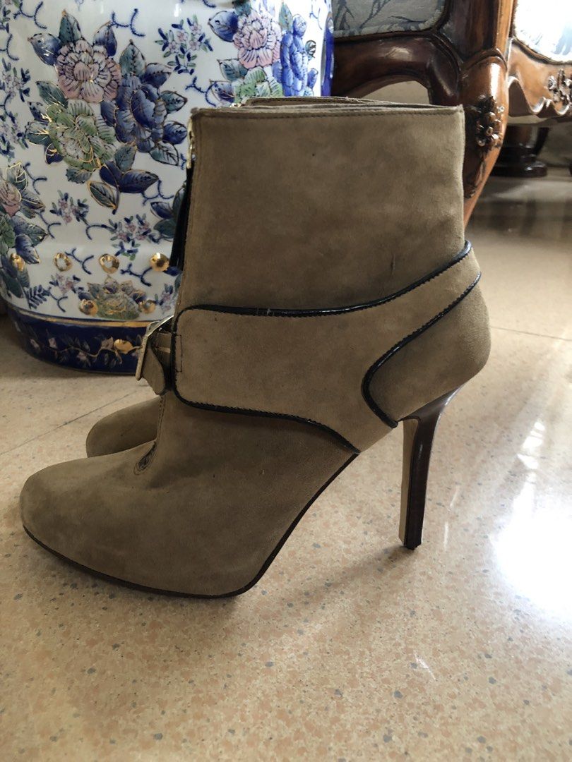 Nine West Suede Heeled Ankle Boots (Category: Boots) located in Davao. Submitted by stylecircuit (Listing ID 1440622531, Image 2). Description: - Nine West tan suede ankle boots - Zip-up front with buckle detail - High stiletto heel - Versatile: great for dressing up or down - Comfortable for a night out.
