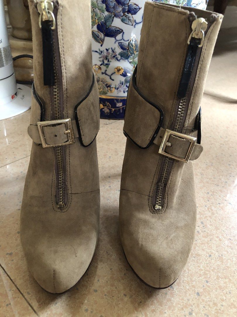 Nine West Suede Heeled Ankle Boots (Category: Boots) located in Davao. Submitted by stylecircuit (Listing ID 1440622531, Image 3). Description: - Nine West tan suede ankle boots - Zip-up front with buckle detail - High stiletto heel - Versatile: great for dressing up or down - Comfortable for a night out.