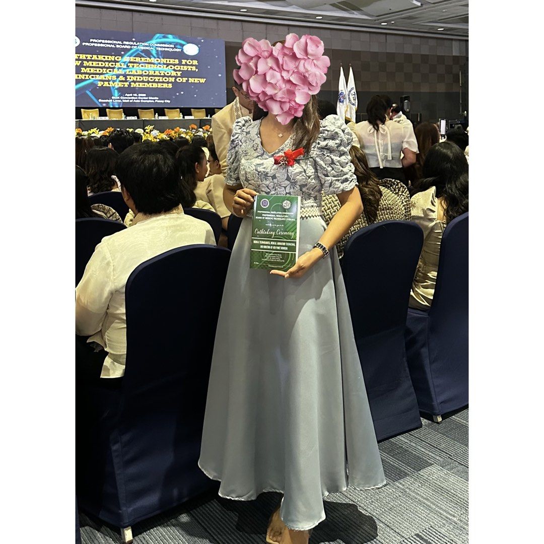 Oathtaking Graduation Modern Filipiniana (Category: Dresses) located in Quezon City. Submitted by ur_shop (Listing ID 1440588238, Image 2). Description: - Beautiful grey maxi dress - Floral print bodice - Puff sleeves - V-neckline - Smooth, satin-like flowing skirt - Ideal for formal events or parties - A standout piece.