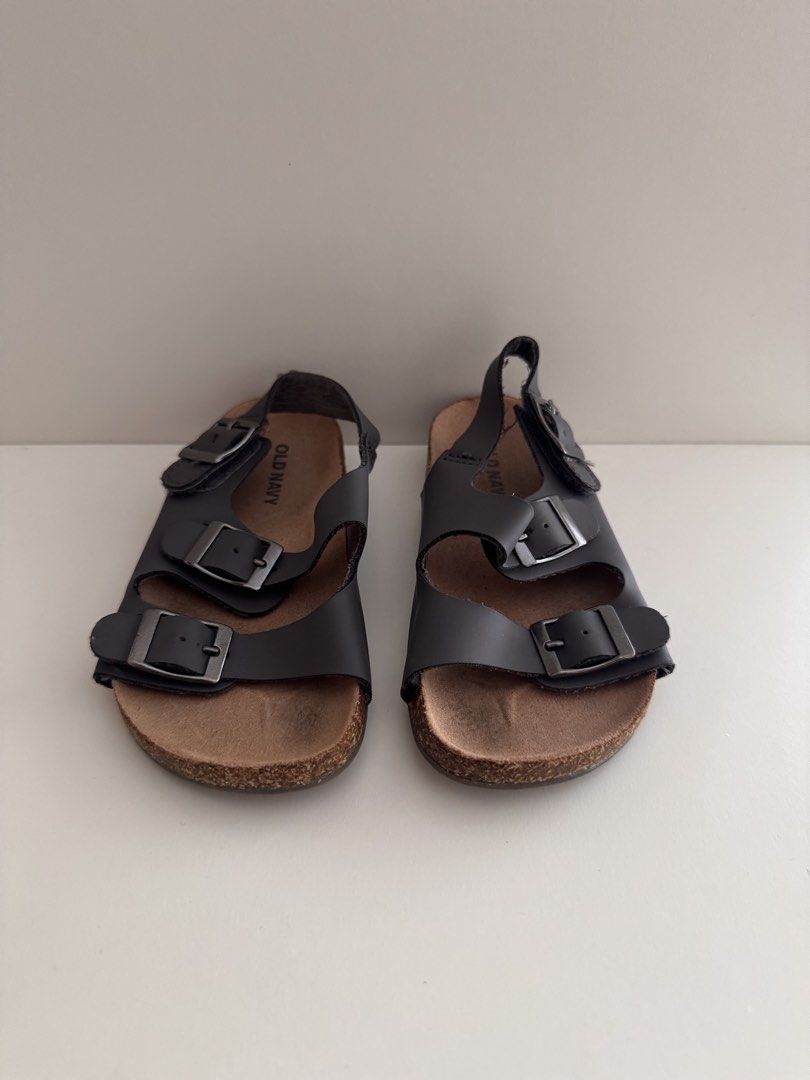 Old Navy Dark Grey Buckle Strap Cork Sandals (Category: Babies & Kids Fashion) located in Manila. Submitted by patrishtrishhh (Listing ID 1440606108, Image 2). Description: - size 25 - Dark grey sandals from Old Navy - Features a comfortable cork sole - Adjustable buckle straps for a secure fit - Easy for kids to wear - Ideal for summer outings - Stylish and comfortable.