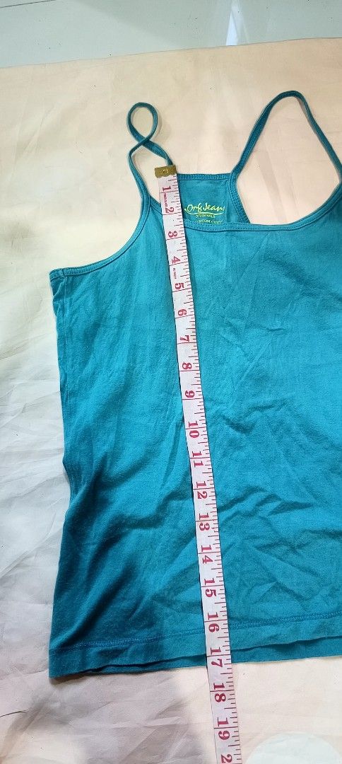 Org Jeans Turquoise Racerback Tank Top (Category: Sleeveless) located in Davao. Submitted by fabmegashop (Listing ID 1440693636, Image 3). Description: - Brand: Org Jeans - Color: Turquoise - Style: Racerback Tank Top - Material: 100% Cotton - Size: 38 - Care: Machine wash cold - Features: Comfortable, breathable fabric - Best for: Casual wear, layering.