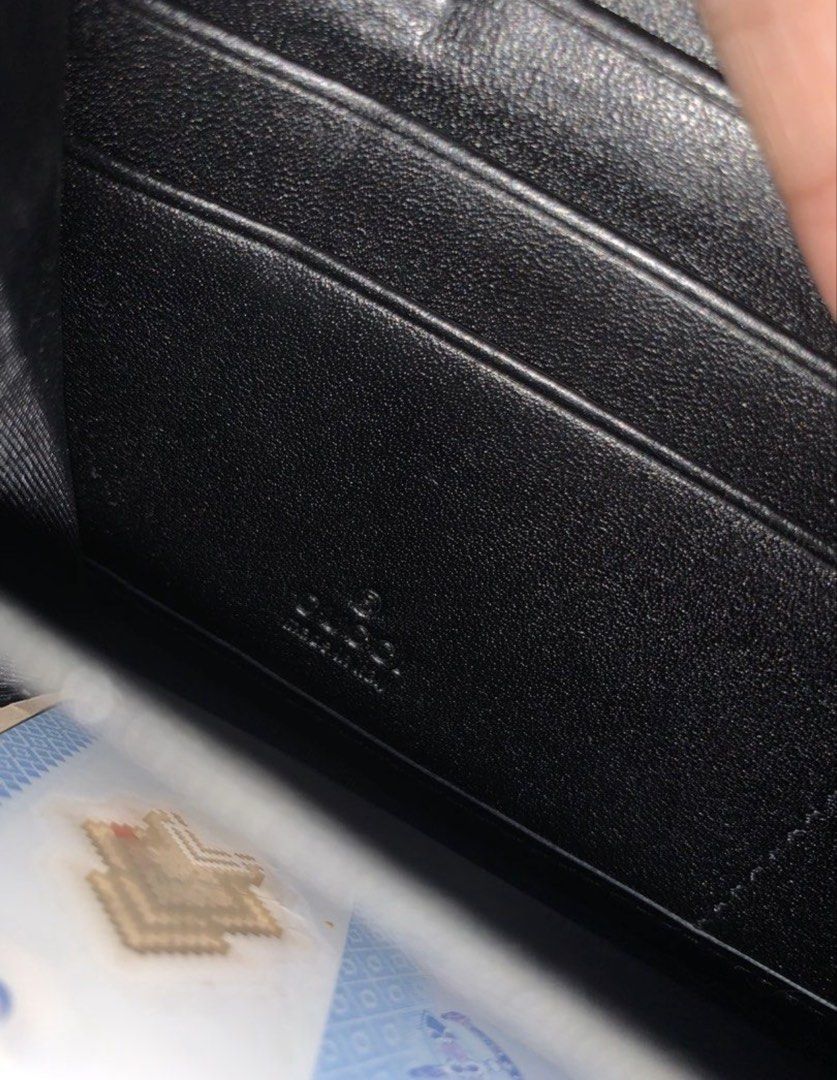 GUCCI Long Wallet Black leather (Category: Luxury Bags & Wallets) located in Cebu City. Submitted by americansurplus (Listing ID 1440703417, Image 2). Description: Gucci long wallet Studded/spiked leather Used but not abused Excellent condition .