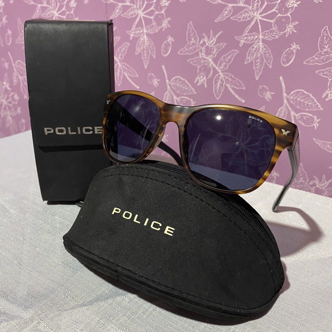 Original Police Sunglasses (Category: Sunglasses & Eyewear) located in Davao. Submitted by ckkb1821 (Listing ID 1440738620, Image 3). Description: Original Police Sunglasses Model COL 0794 140 Medium fit for frame & lenses Like new condition, comes with 2 cases ₱7,999 only +sf.