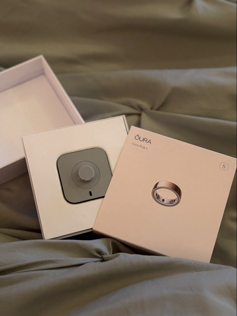 Oura Ring Gen 4 Rose Gold Size 5 (Category: Other Gadgets) located in Quezon City. Submitted by lovevintage22 (Listing ID 1440711755, Image 3). Description: - Oura Ring Gen 4 - Color: Rose Gold - Size: 5 - Used for a week only - Will be reformatted before selling. - RFS: Wrong size - Tracks: Sleep, Activity, Readiness - Includes: Charger, Original Packaging, Receipt, Warranty.