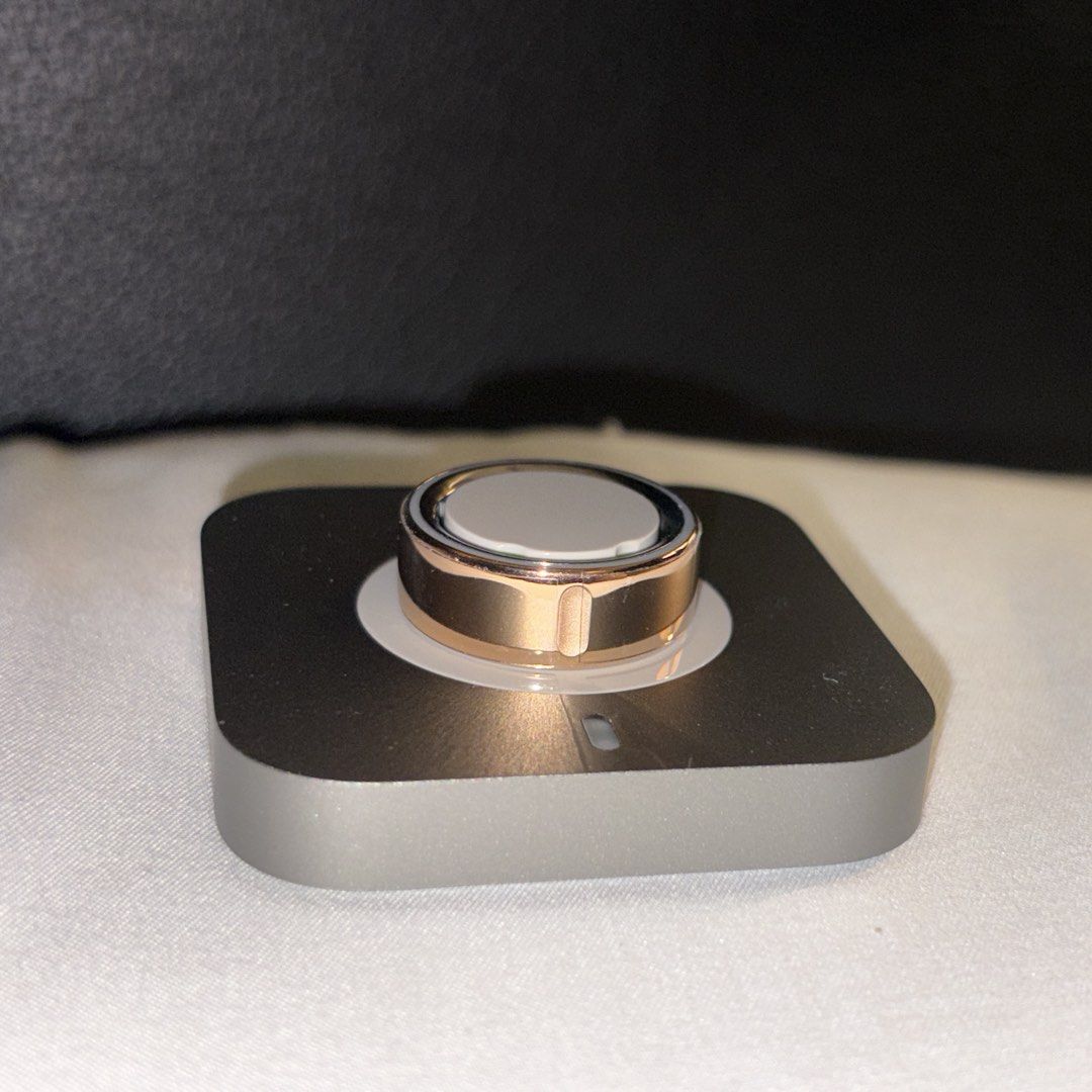 Oura Ring Gen 4 Rose Gold Size 5 (Category: Other Gadgets) located in Quezon City. Submitted by lovevintage22 (Listing ID 1440711755, Image 2). Description: - Oura Ring Gen 4 - Color: Rose Gold - Size: 5 - Used for a week only - Will be reformatted before selling. - RFS: Wrong size - Tracks: Sleep, Activity, Readiness - Includes: Charger, Original Packaging, Receipt, Warranty.