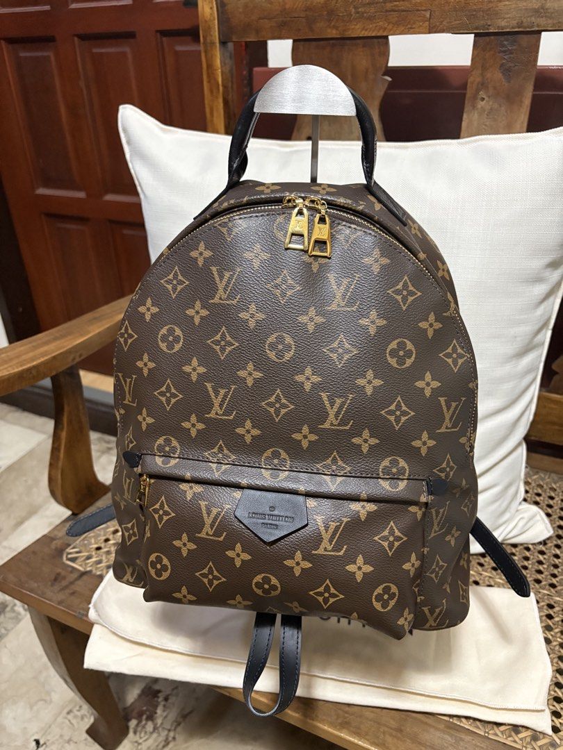 Palm Springs Backpack (Category: Luxury Bags & Wallets) located in Mandaue City. Submitted by jane2872 (Listing ID 1440680555, Image 2). Description: - Palm Springs backpack - Size GM - Classic monogram canvas - Black leather straps and trim - Gold hardware - charm not included - Ideal for daily use or travel - Spacious interior.