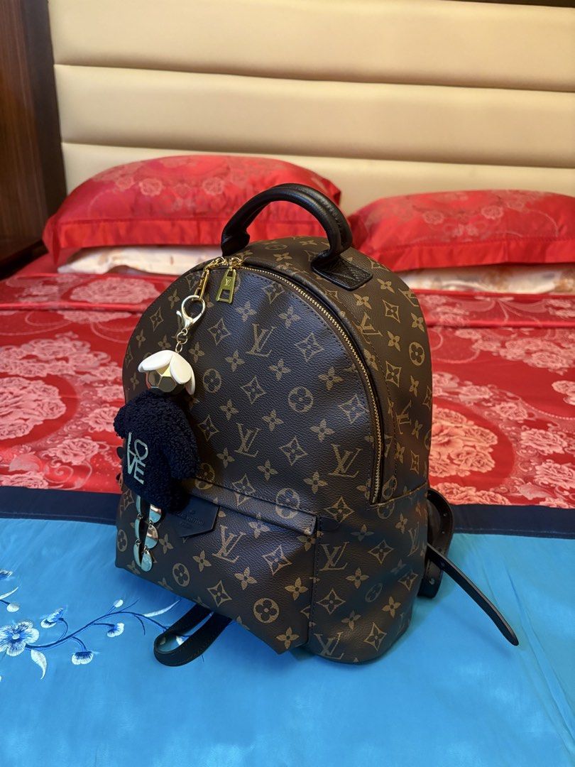Palm Springs Backpack (Category: Luxury Bags & Wallets) located in Mandaue City. Submitted by jane2872 (Listing ID 1440680555, Image 1). Description: - Palm Springs backpack - Size GM - Classic monogram canvas - Black leather straps and trim - Gold hardware - charm not included - Ideal for daily use or travel - Spacious interior.