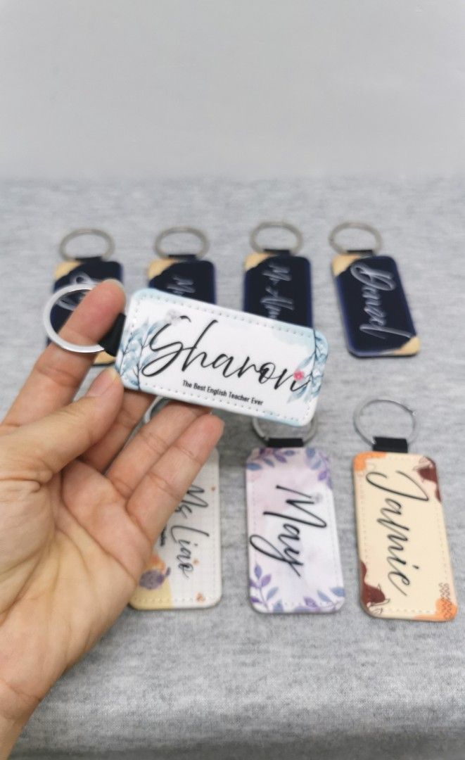 Personalized Keychains (Category: Handmade Craft) located in Singapore. Submitted by emporium_choices (Listing ID 1440598245, Image 2). Description: - Customizable keychains with your name or any design! - Ideal as personalized gifts for teachers, friends, or family. - Features a durable strap and a sturdy metal ring. - Perfect for attaching to bags, keys, or using as a unique accessory. PM me for more information!!💗 .