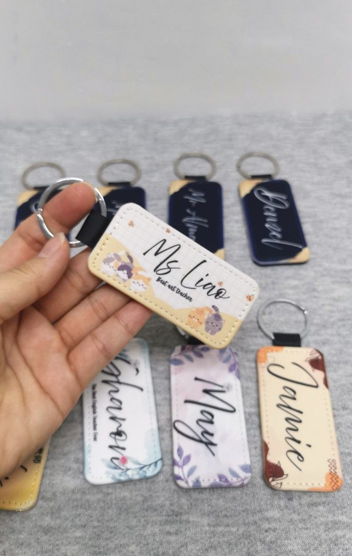 Personalized Keychains (Category: Handmade Craft) located in Singapore. Submitted by emporium_choices (Listing ID 1440598245, Image 3). Description: - Customizable keychains with your name or any design! - Ideal as personalized gifts for teachers, friends, or family. - Features a durable strap and a sturdy metal ring. - Perfect for attaching to bags, keys, or using as a unique accessory. PM me for more information!!💗 .