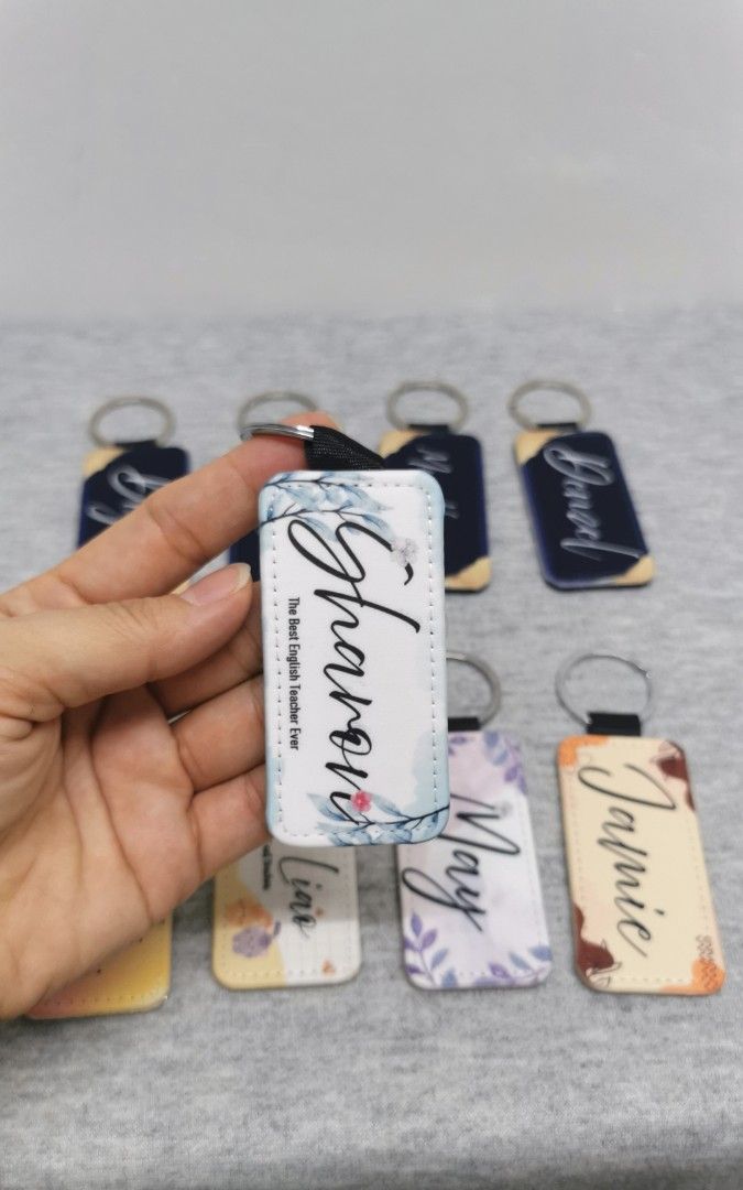 Personalized Keychains (Category: Handmade Craft) located in Singapore. Submitted by emporium_choices (Listing ID 1440598245, Image 1). Description: - Customizable keychains with your name or any design! - Ideal as personalized gifts for teachers, friends, or family. - Features a durable strap and a sturdy metal ring. - Perfect for attaching to bags, keys, or using as a unique accessory. PM me for more information!!💗 .