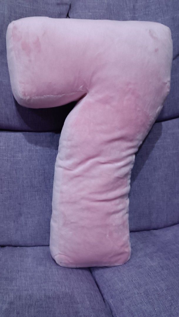 Pink Number 7 Shaped Plush Pillow (Category: Plushies & Soft Toys) located in Quezon City. Submitted by fabricatebycp (Listing ID 1440755498, Image 1). Description: Cute pink pillow shaped like the number 7. Soft plush material. Great for decoration or as a comfy cushion. Measures about 18 inches tall. Perfect for a child's room or a fun accent piece. Adds a pop of color to any space. Good condition, no major flaws..
