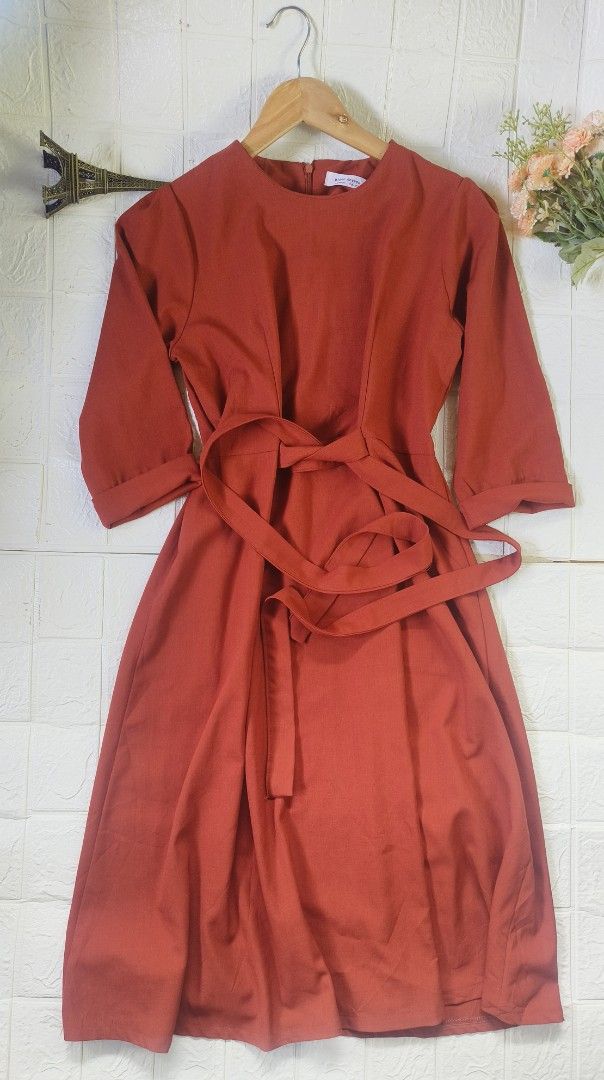 Plain Midi Dress with Belt (Category: Dresses) located in Tagbilaran City. Submitted by grazie95 (Listing ID 1440622502, Image 1). Description: - Plain Haven midi dress in a beautiful red color. - Features a tie belt to cinch the waist. - Three-quarter length sleeves that can be cuffed. - Convenient back zipper closure. - Versatile for both casual outings and dressing up. can fit up to large.