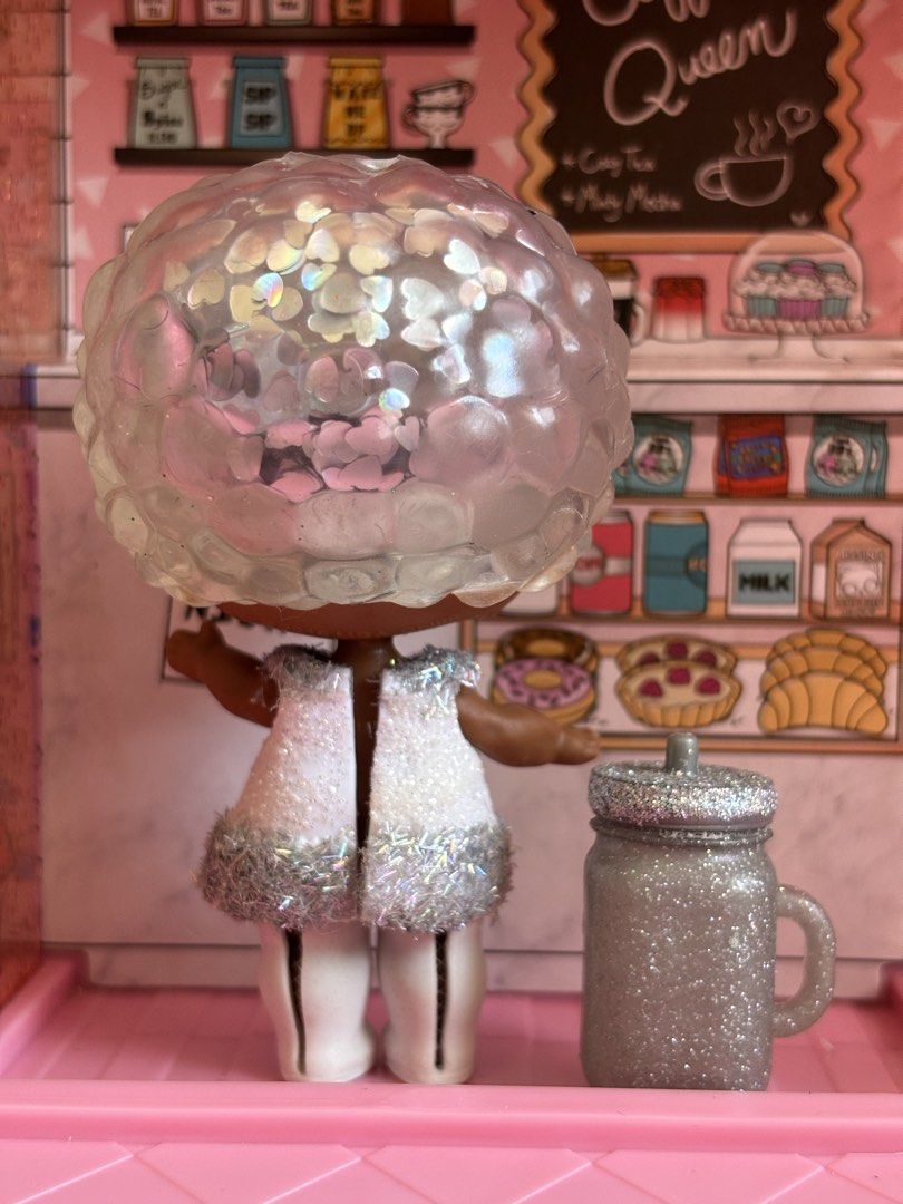 PRELOVED LOL SURPRISE DOLL (WINTER DISCO GLITTER GLOBE) (Category: Kids Toys) located in Bulacan. Submitted by lmsdeclutteringcorner (Listing ID 1440659233, Image 2). Description: - LOL Surprise Glitter Series doll - Sparkly white outfit - Glittery jar accessory - Big, glittery eyes - Unique, iridescent afro hairstyle - Includes original packaging tubes - Ideal for collectors -with inclusion of 1 LOL Storage .