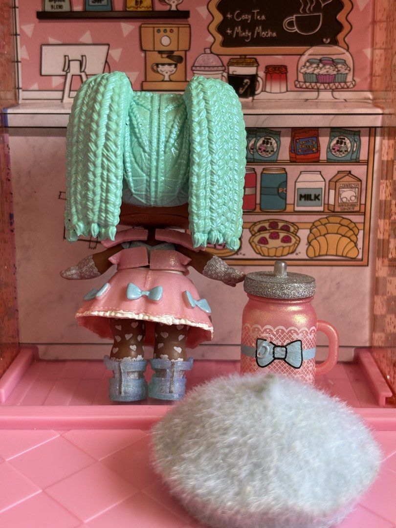 PRELOVED LOL SURPRISE DOLL-HIGH TEA (Category: Kids Toys) located in Bulacan. Submitted by lmsdeclutteringcorner (Listing ID 1440660523, Image 2). Description: - LOL Surprise Doll with mint green hair and pink dress - Includes pink mug - Includes fluffy beret - Comes with 1 LOL Surprise case - Great for collectors or playtime.