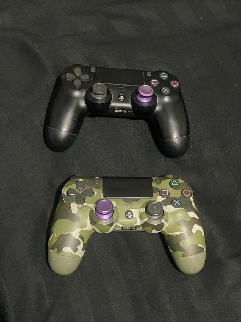 PS4 Slim Console with 2 Controllers (Category: PlayStation) located in Iloilo. Submitted by wiredknives (Listing ID 1440686634, Image 2). Description: *NEGOTIABLE* Clean and well-maintained PS4 Slim with custom hand-painted/customized design 🎨💀 US-bought unit and runs smoothly with no overheating or performance issues. 🎮 Includes: * PS4 Slim 1TB * 2 Controllers * HDMI + Power Cable 📌 Notes: * Black controller works perfectly * Camo controller