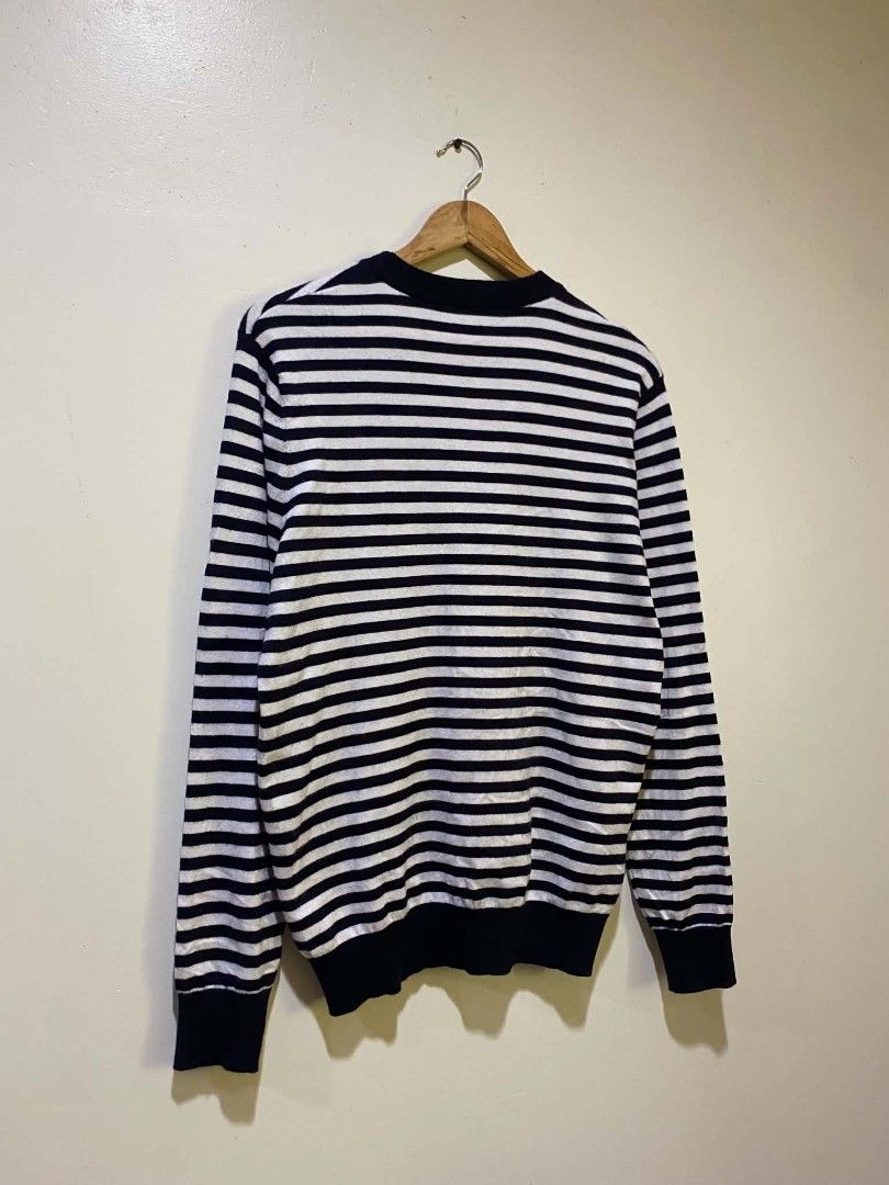 Saint Laurent Paris Striped sweater (Category: Luxury Apparel) located in Manila. Submitted by livehorse.542a4e (Listing ID 1440663727, Image 2). Description: - Brand: Saint Laurent Paris - Color: Navy and White Stripes - Style: Crew neck, long sleeves - Features: Timeless, versatile for layering - Care: Refer to label - 27.5X20.