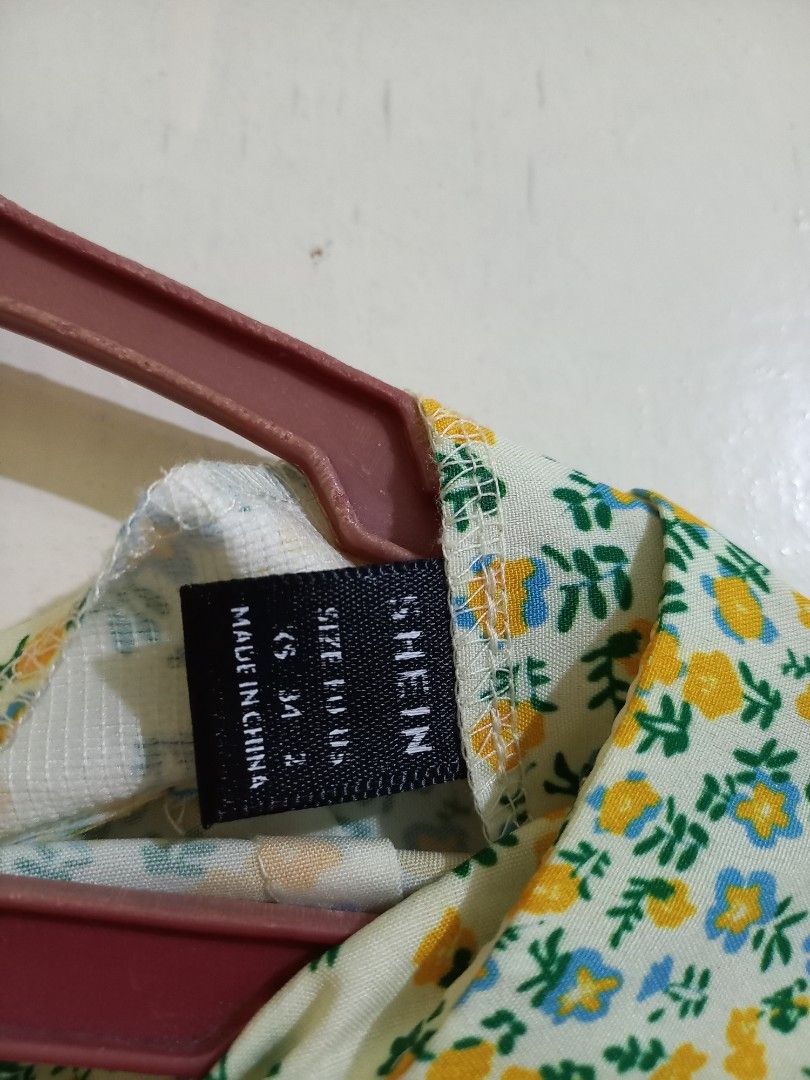 SHEIN Floral Skirt (Category: Dresses) located in Bulacan. Submitted by abscissa (Listing ID 1440690088, Image 1). Description: - Cute floral skirt from SHEIN - Yellow and blue flowers on a white background - Ideal for casual wear.