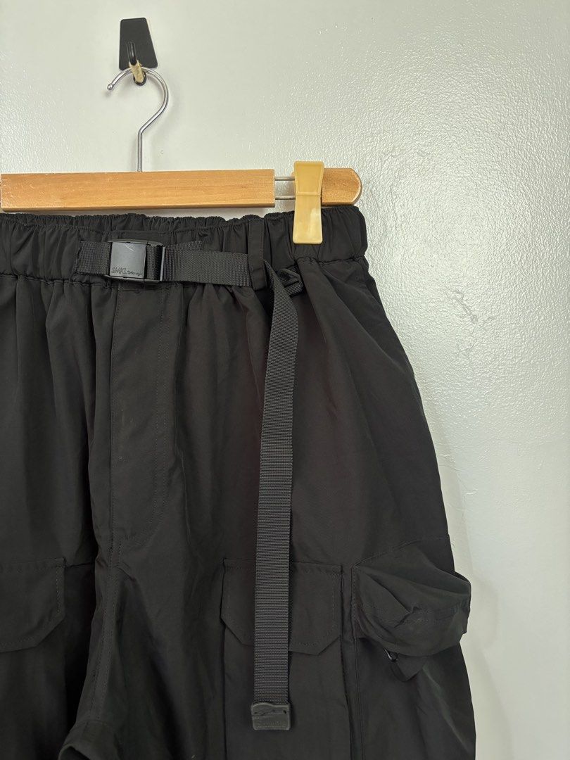 SmokingLife Multi Pocket Nylon Cargo Pants (Category: Luxury Apparel) located in Bacoor. Submitted by jewa333 (Listing ID 1440703649, Image 2). Description: SmokingLife Multi Pocket Nylon Cargo Pants. XL on tag. Dimes: Waist 30-36 (Garterized) Length 39” Leg Opening 10” (adjustable) Pristine Condition. Issue: None 🏷️1,500 only 📥📥📥.